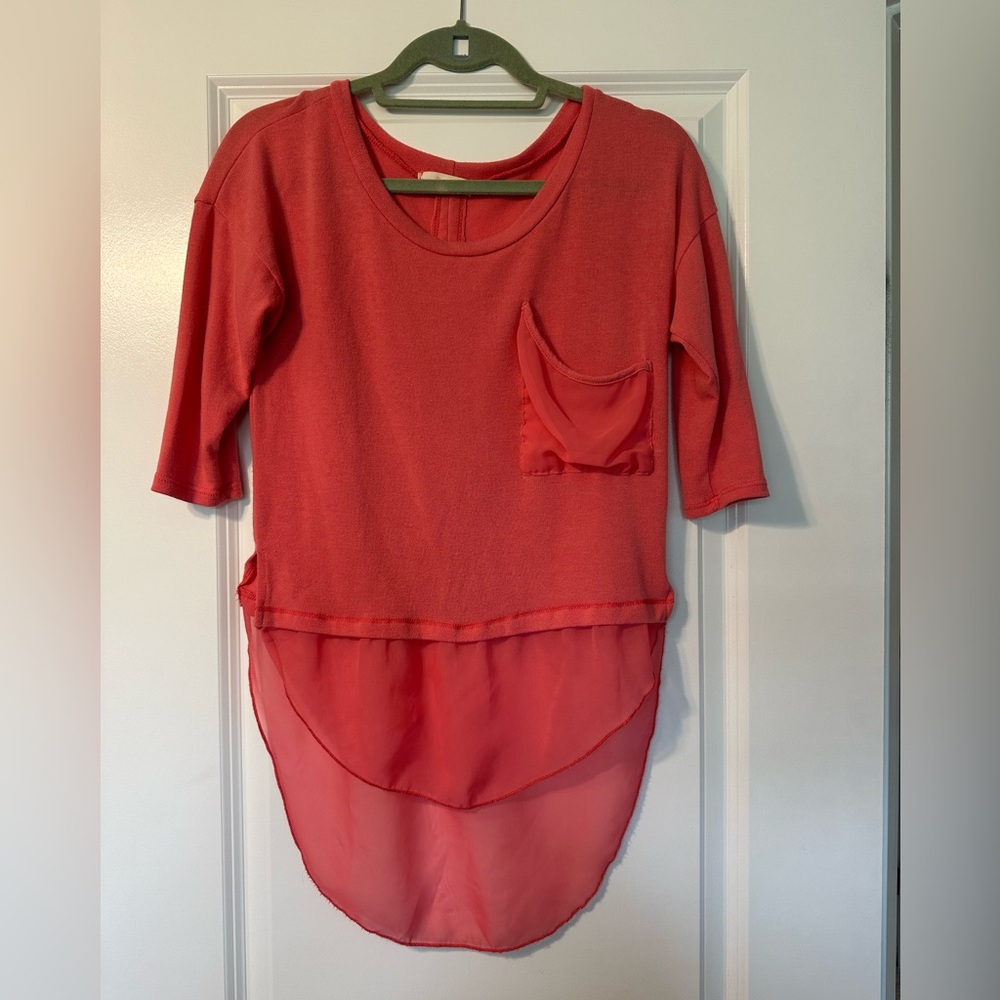 Coral Sweater Too with Sheer Detailing and Slit Back. Size small.